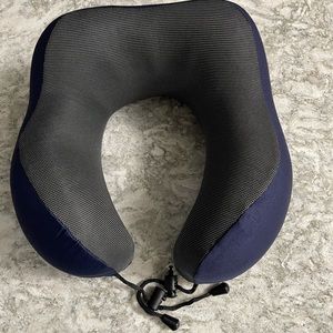 Travel pillow with accessories new with- packaging not open and never used.